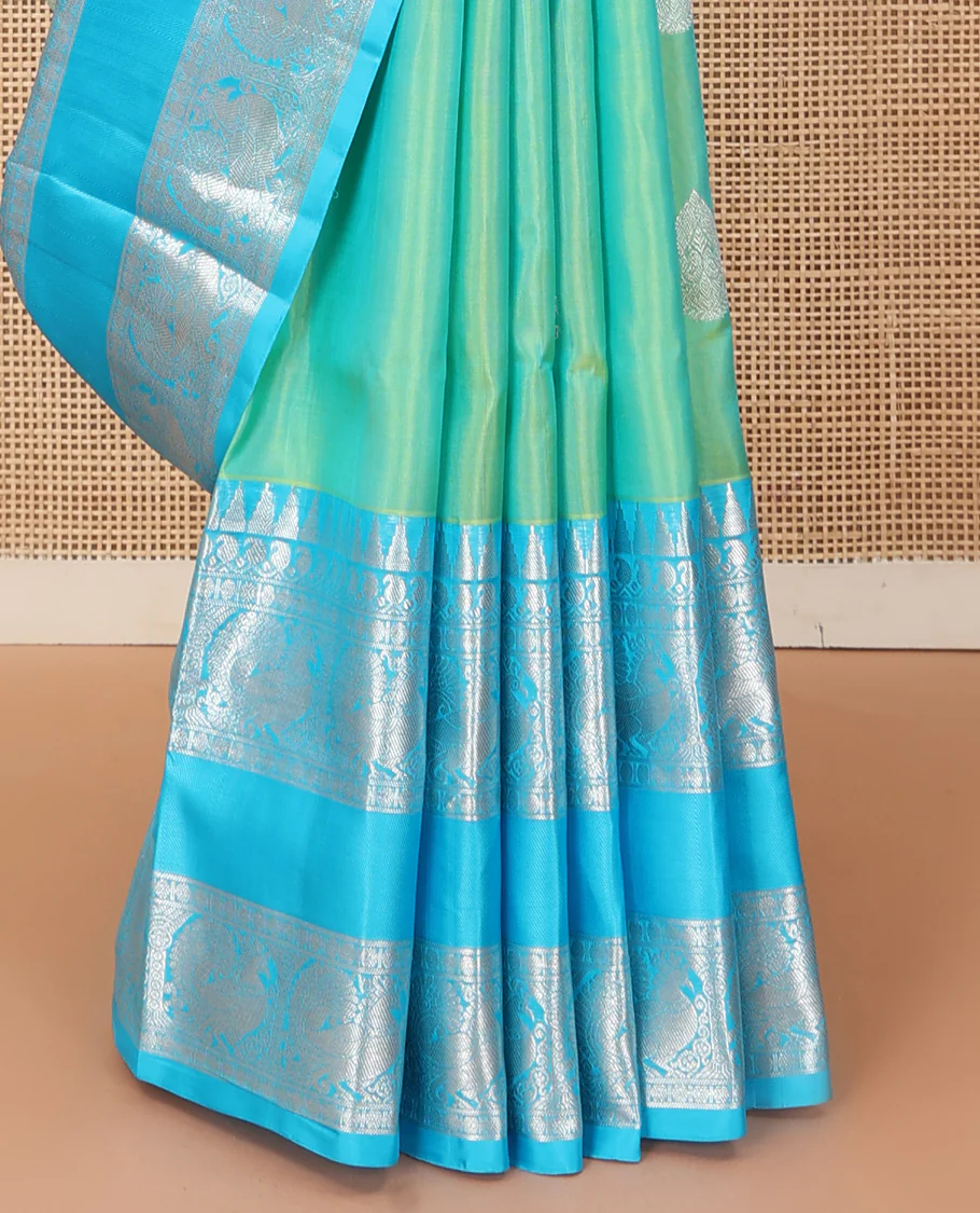 Aqua green dual-tone zari buttas Venkatagiri silk saree, contrast traditional zari rettai pettu border of peacock designs, and pallu of chakra, and rudraksham - Image 5