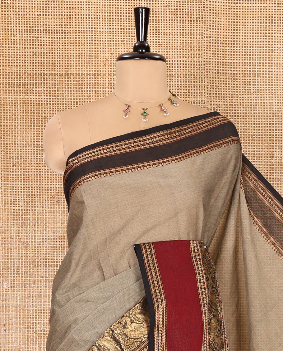 Beige plain Chettinad cotton saree, contrast rettai pettu peacock motifs border, striped pallu, and a matching blouse - Image 2