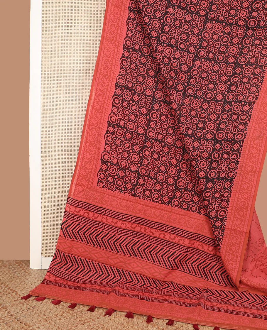 Black Ajrakh printed mixed cotton saree, contrast traditional floral creeper border, and geometric printed blouse - Image 2