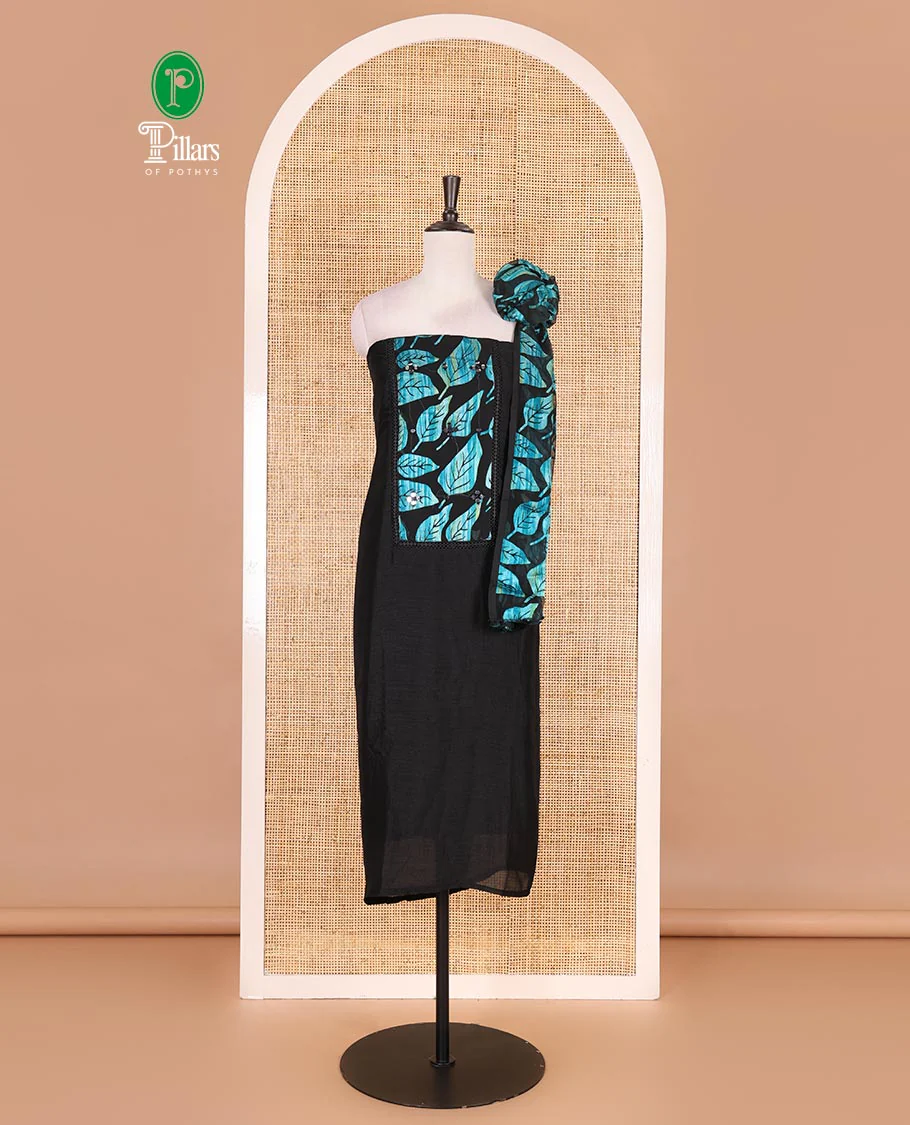 Black and blue material churidar set, neck leaf print with mirror work Vichitra silk top, plain santoon bottom, and leaf printed shimmer georgette dupatta