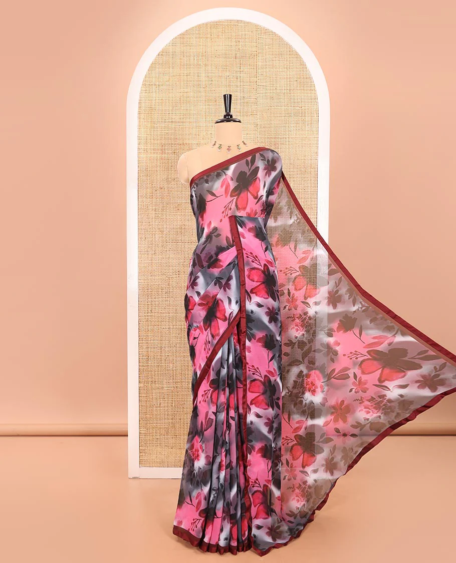 Black and Pink Chiffon Saree Elegantly Steeped with Floral Motifs Print, Subtly Made Lace Border, Self-Printed Pallu, and Paired with a Contrast-Printed Blouse