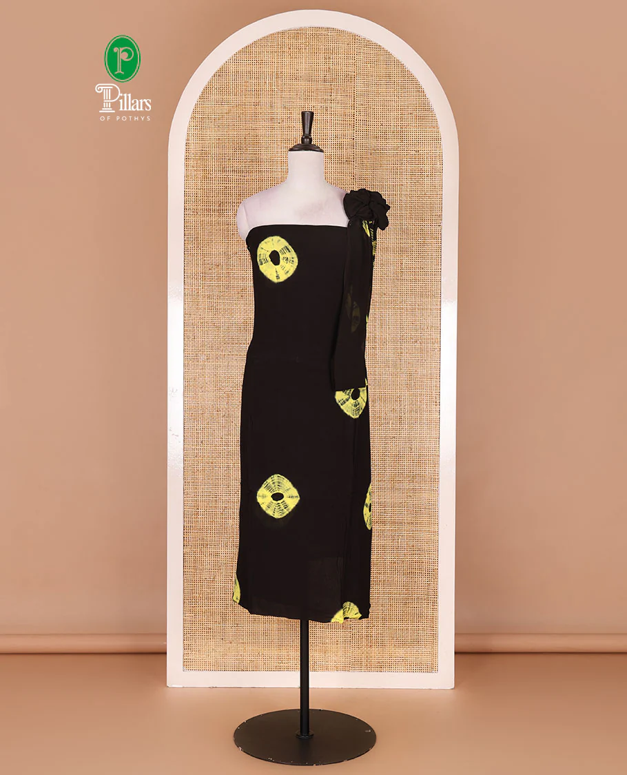 Black and yellow viscose georgette material churidar set, big bandhani dots printed top, plain bottom, and big bandhani dots printed dupatta
