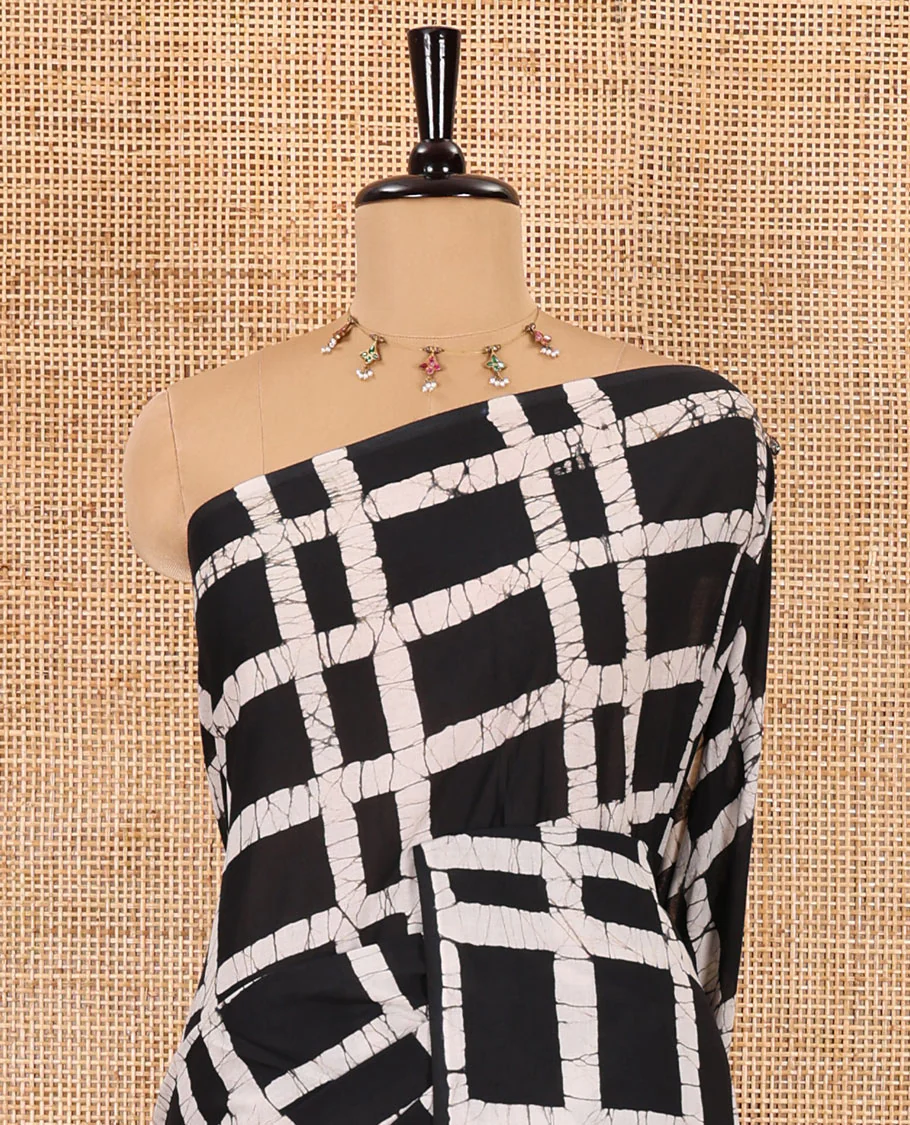 Black checked batik printed mul cotton saree, contrast kaleidoscope colored batik printed pallu, and a contrast batik printed blouse - Image 6