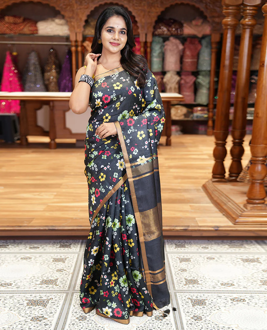 Black colorful floral printed banana pith saree, piping zari border, zari decked pallu, and a contrast floral printed blouse - Image 2
