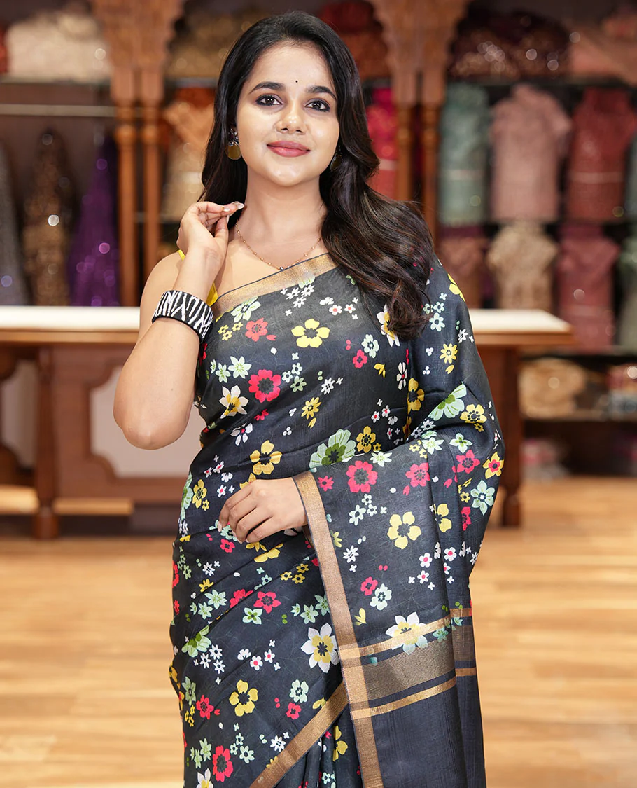 Black colorful floral printed banana pith saree, piping zari border, zari decked pallu, and a contrast floral printed blouse - Image 3