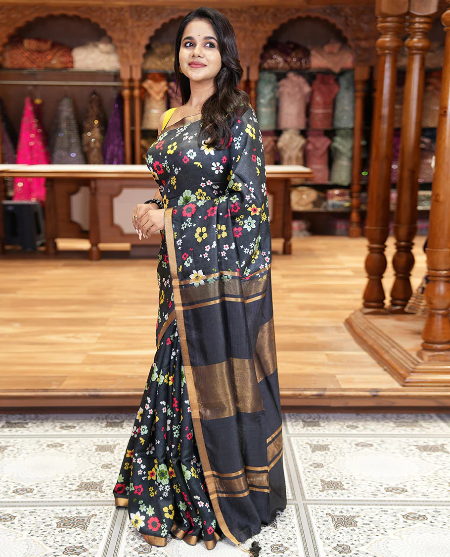 Black colorful floral printed banana pith saree, piping zari border, zari decked pallu, and a contrast floral printed blouse - Image 4