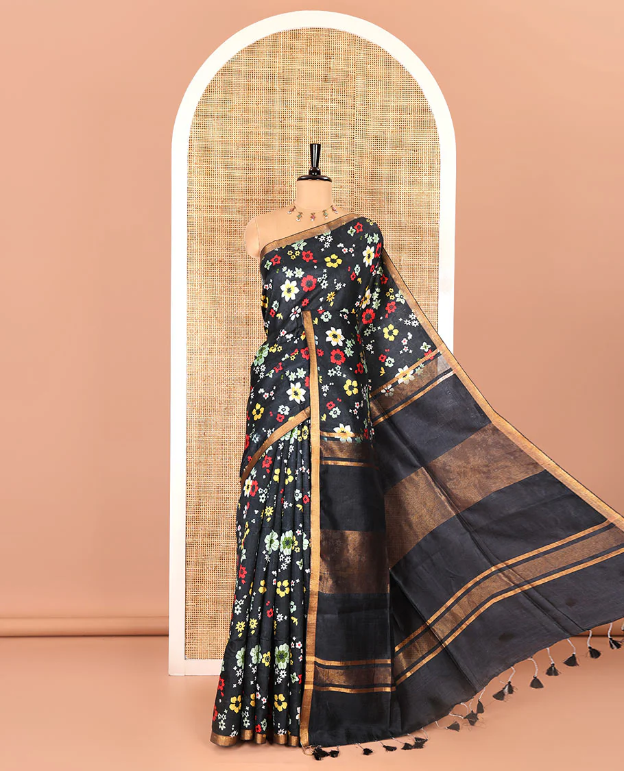Black colorful floral printed banana pith saree, piping zari border, zari decked pallu, and a contrast floral printed blouse - Image 5