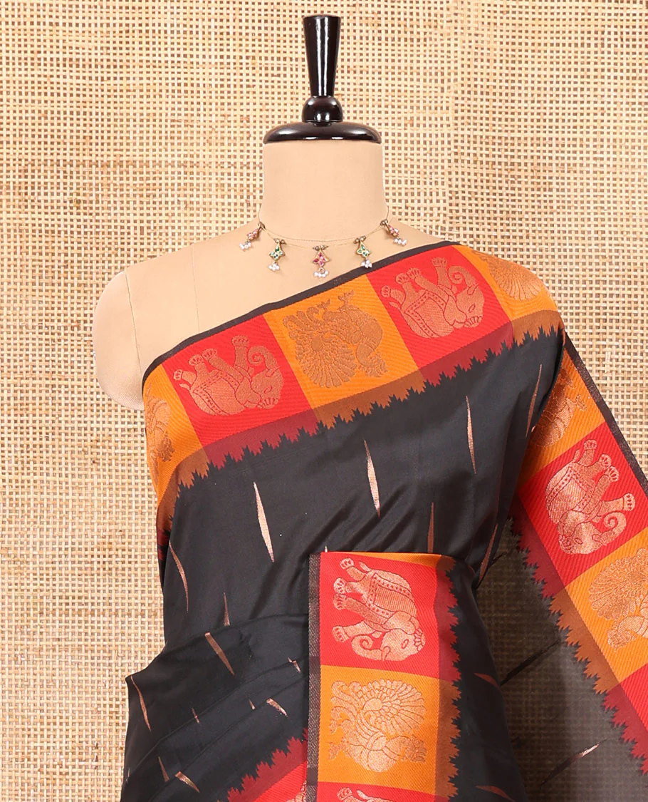 Black copper zari buttas woven kanchi silk saree, contrast temple border of peacock and elephant motifs, zari-rich pallu, and a zari design blouse - Image 2