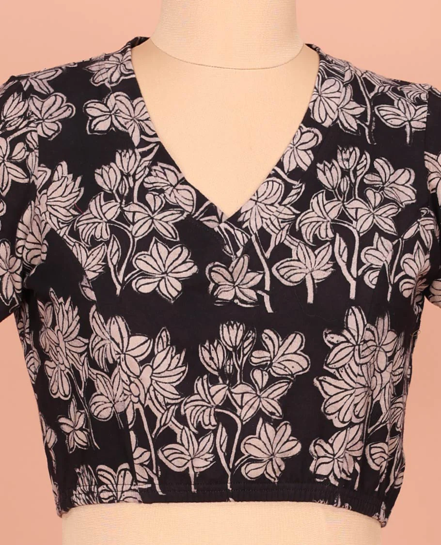 Black Cotton Readymade Blouse Subtly Sparked with All-Over Floral Print, Featuring a Front Leaf-Neck, a Closed Back Neck, and Elbow Sleeves - Image 2