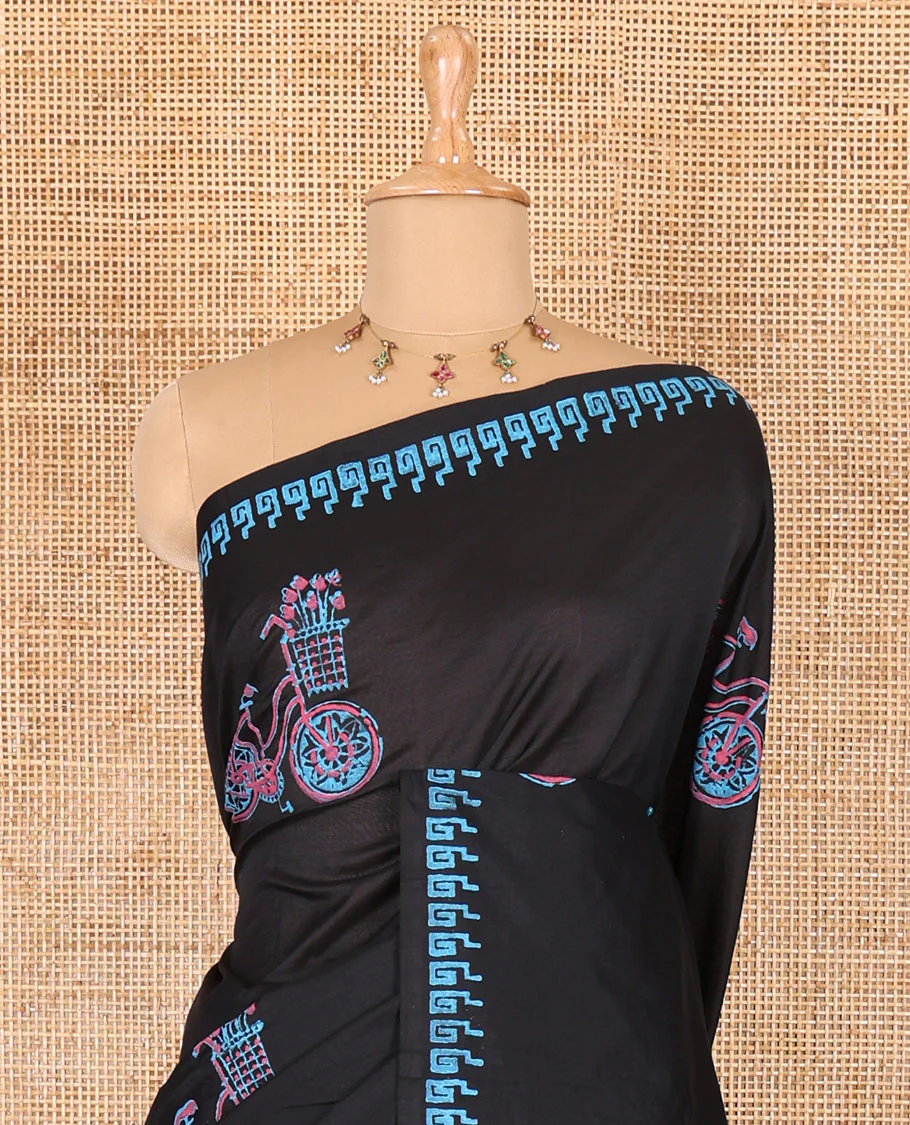 Black cycle with flower basket motifs block printed South cotton saree, Greek key motifs block printed border, a matching blouse, and a contrast floral motifs printed blouse - Image 3