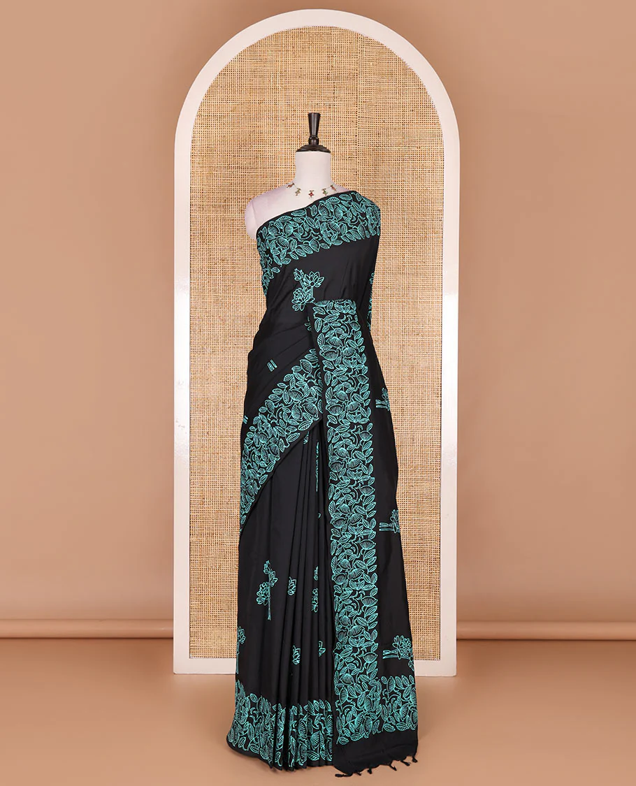Black floral motifs hand block printed South cotton saree, floral hand block printed border and pallu, along with a contrast printed blouse - Image 2