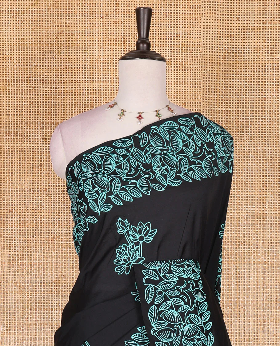 Black floral motifs hand block printed South cotton saree, floral hand block printed border and pallu, along with a contrast printed blouse - Image 3