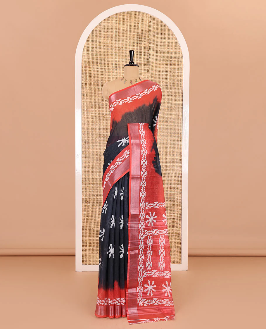 Black flower motifs batik printed linen cotton saree, contrast printed with zari woven border, batik printed pallu, and a contrast printed blouse - Image 2