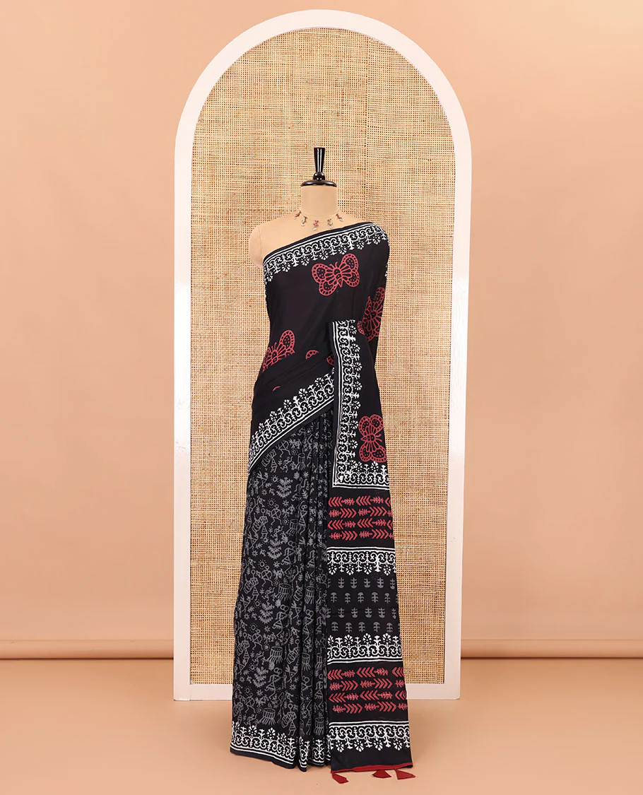 Black half-and-half style butterflies and warli theme block printed soft mul cotton saree, printed border, floral printed pallu, and a plain blouse - Image 2