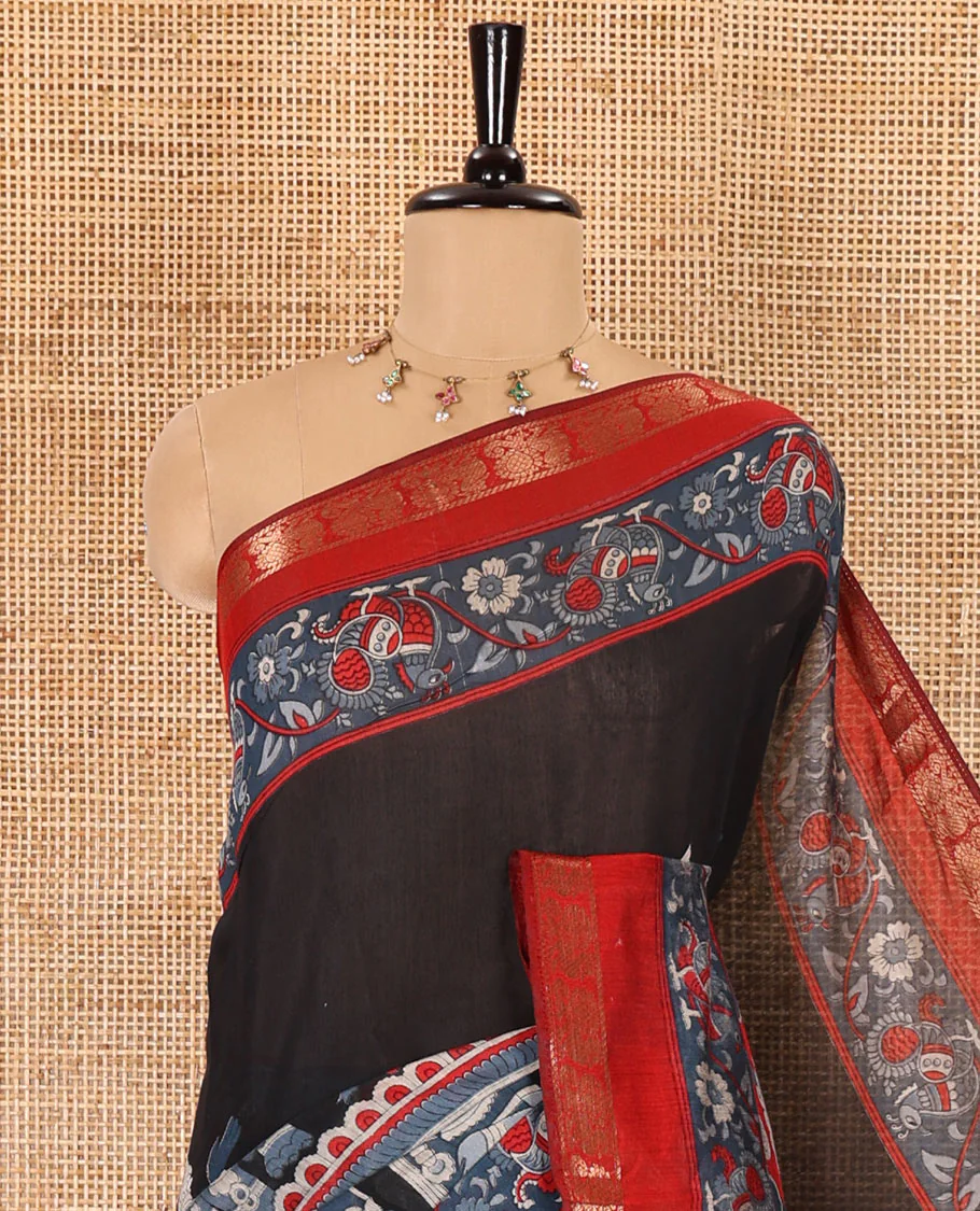 Black kalamkari ancient human figurines machine-printed muslin cotton saree, contrast traditional design zari border, kalamkari printed pallu, and contrast floral motifs and zari bordered blouse - Image 2