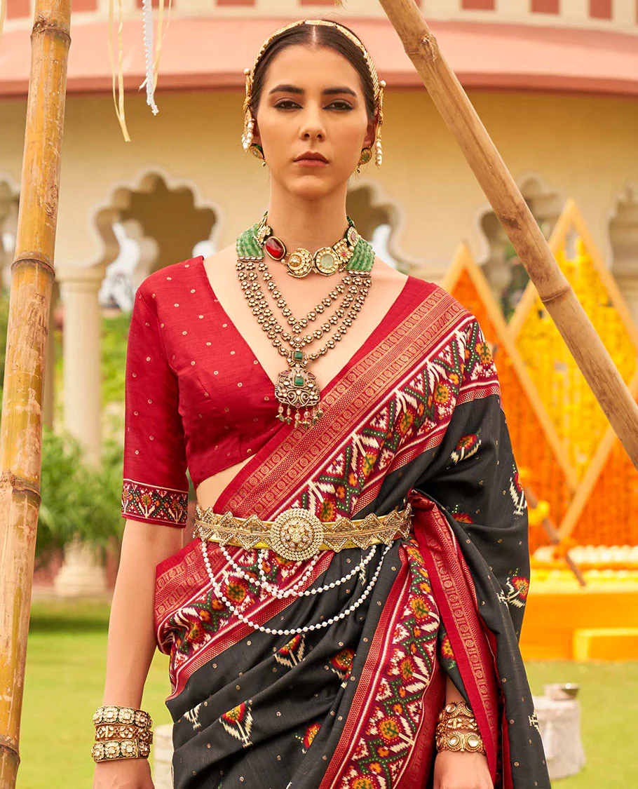 Black patola floral motifs printed designer saree, contrast intricate patola border, and floral motifs patola printed pallu - Image 2