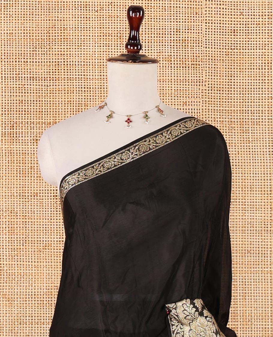 Black plain crepe saree, zari border steeped with rose floral designs, plain pallu & blouse of zari polka dots - Image 3