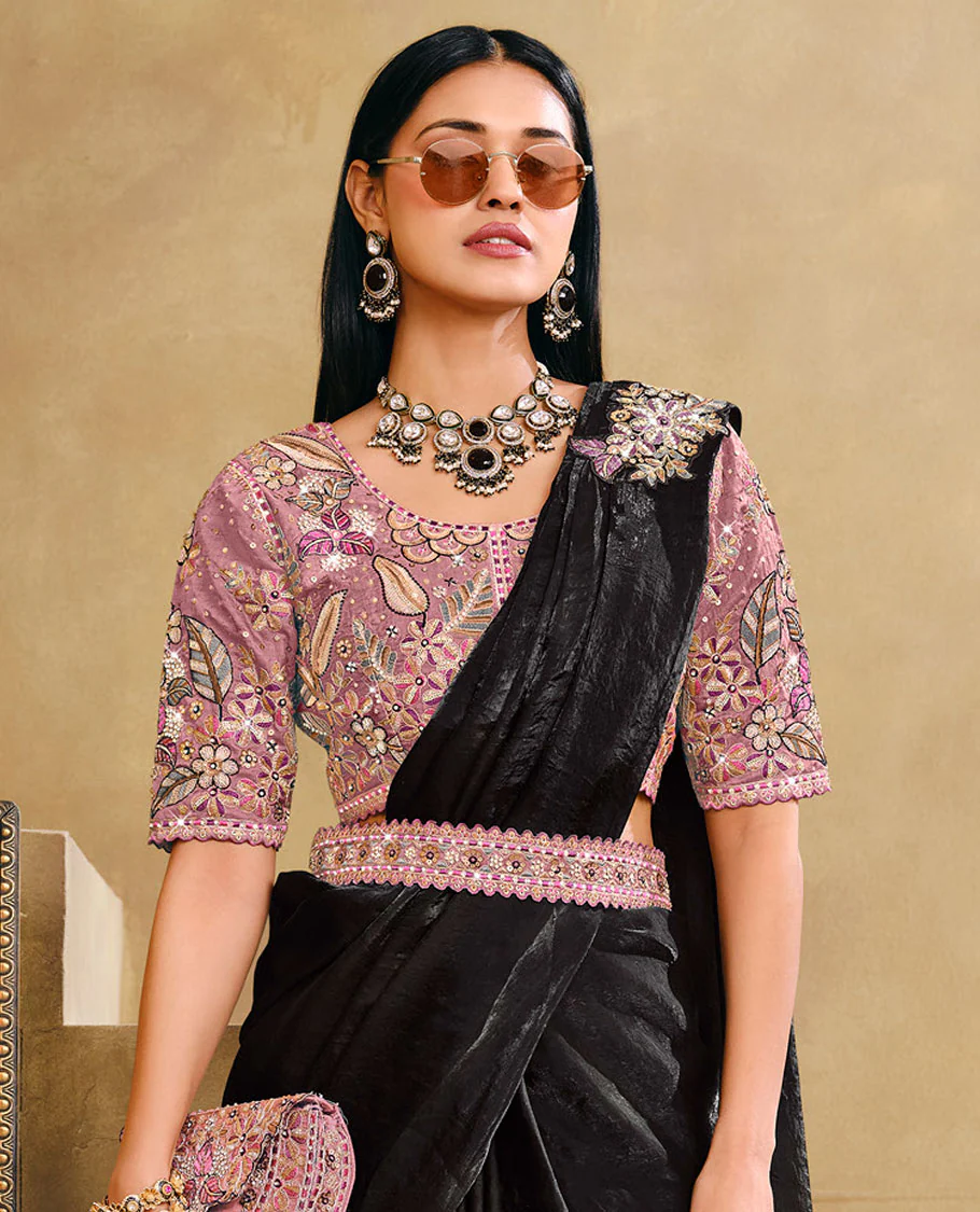 Black Plain Party Wear Designer Saree, Complemented with a Contrast Round Neck Heavy Embroidered Elbow Sleeve Readymade Blouse, Detachable Embroidered Belt, and a Free Embroidered Flap Sling Bag - Image 2