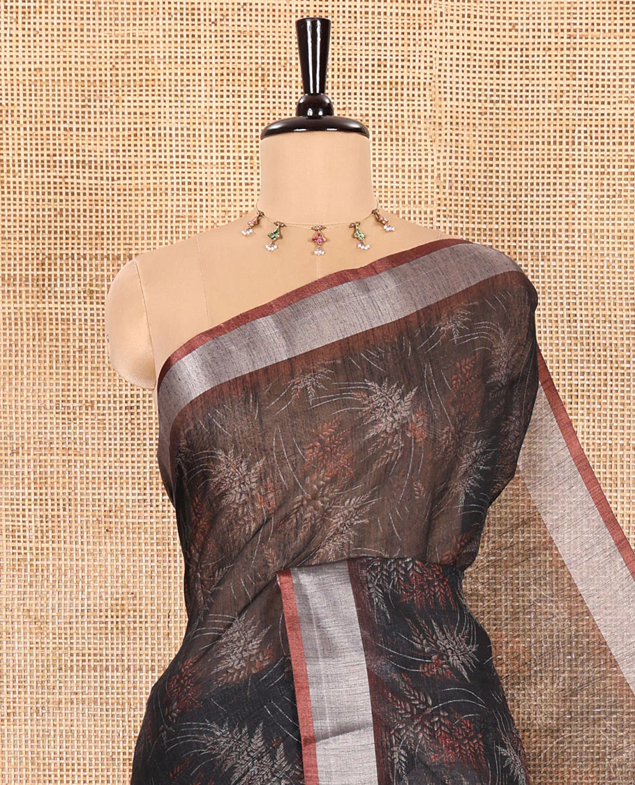 Black Printed Linen Cotton Saree Adorned with Leaf Motif Prints, Complemented by a Contrast Bavanji Border, Featuring a Geometric Printed Pallu, Paired with a Subtle Matching Blouse - Image 2