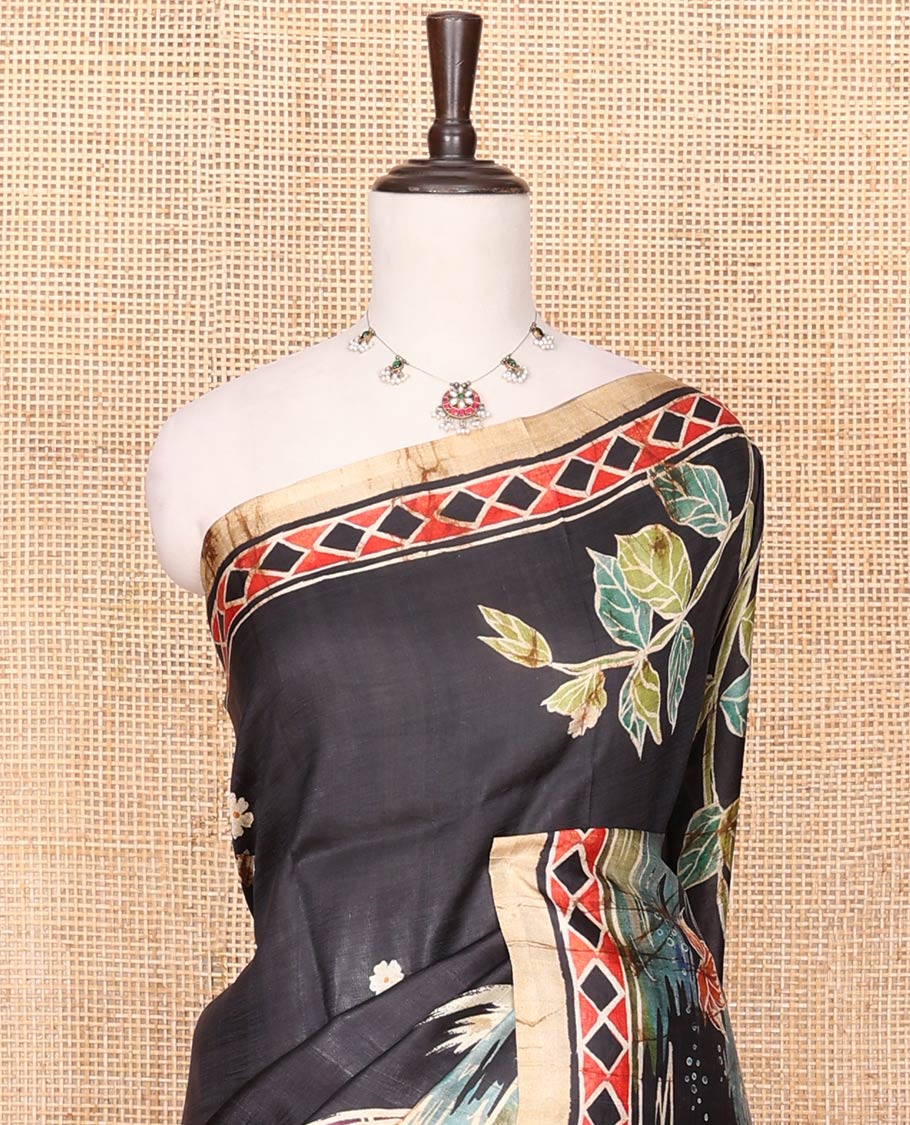 Black Printed Silk Saree Adorned with Colorful Floral Motifs Printed All Across Its Body, Highlighted with a Contrast Geometric Printed Border, Pallu Depicting the Darwing of Goddess Durga Killing Mahishasura, and Attached with a Printed Blouse - Image 3