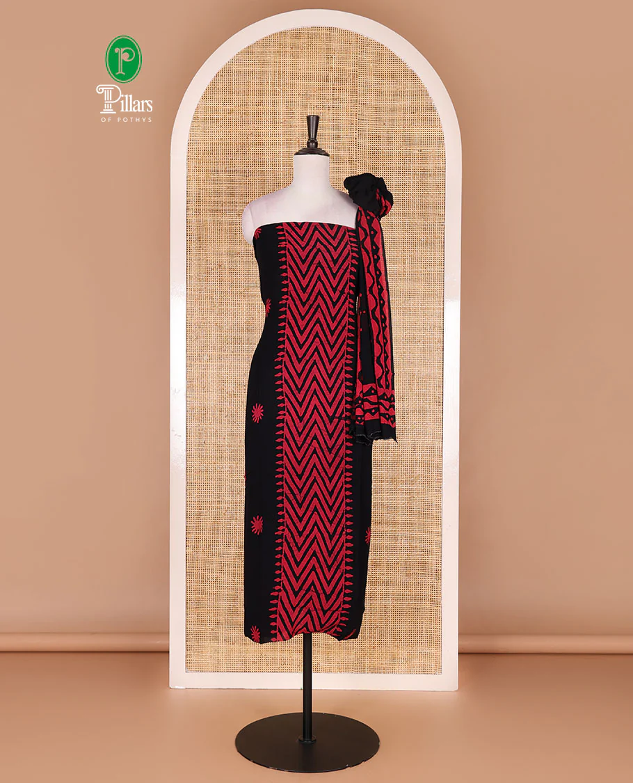 Black-rani pink material chudidar set, chevron stripes hand block printed viscose georgette top, contrast santoon bottom, and viscose georgette hand block printed dupatta