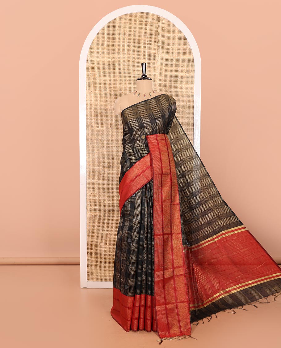Black Semi-Raw Silk Saree Gleamed with Rudraksham Buttas and Zari Checks, Featuring a Captivating Contrast Zari-Woven Border, a Pallu Adorned with Zari Designs, and Paired with a Contrast Blouse