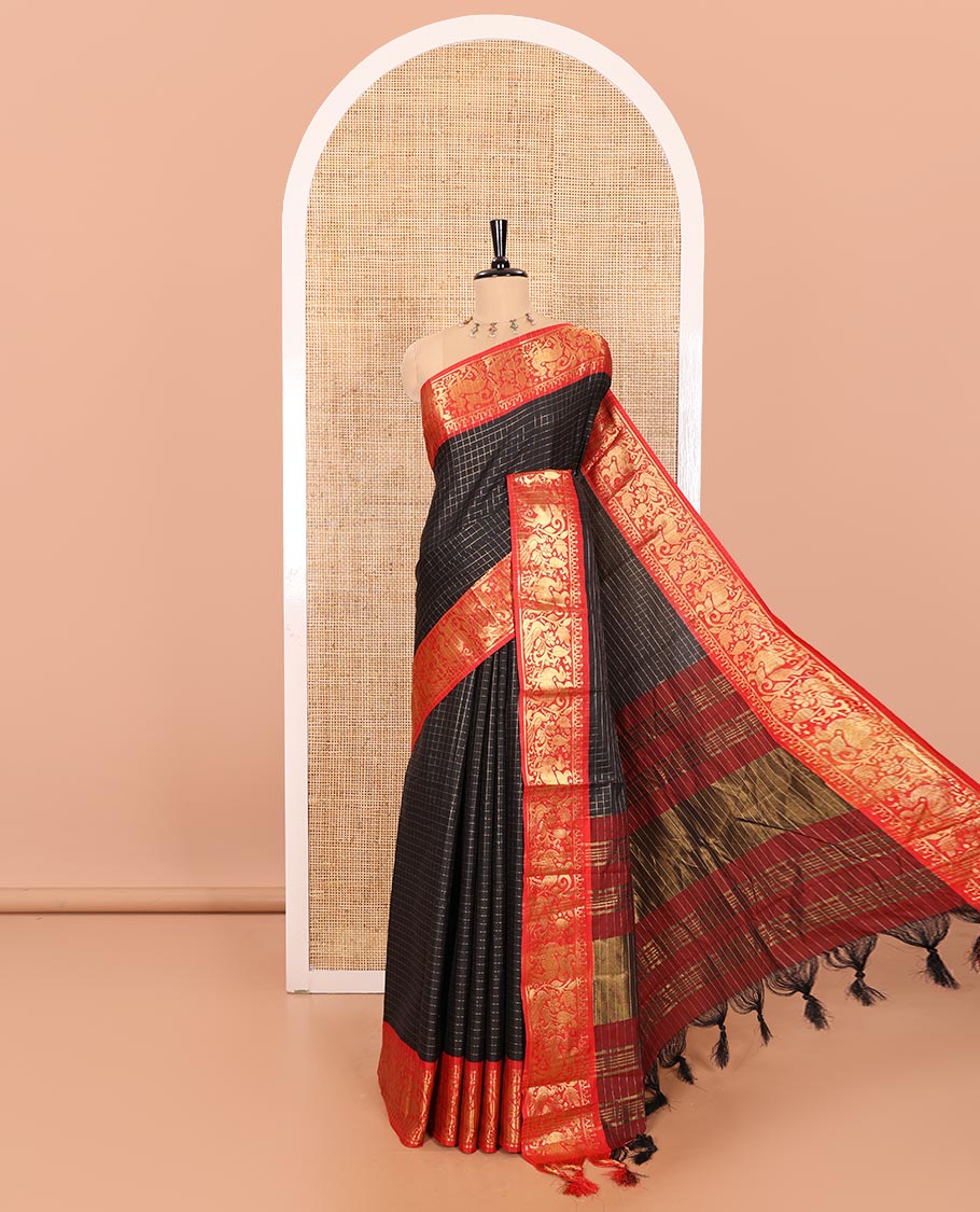 Black Semi-Taffeta Saree Decked up with Medium-Sized Zari Checks, Complemented with a Contrast Border Featuring Floral and Deer Motifs in Zari, Pallu of Stripes, and Paired with a Contrast Blouse
