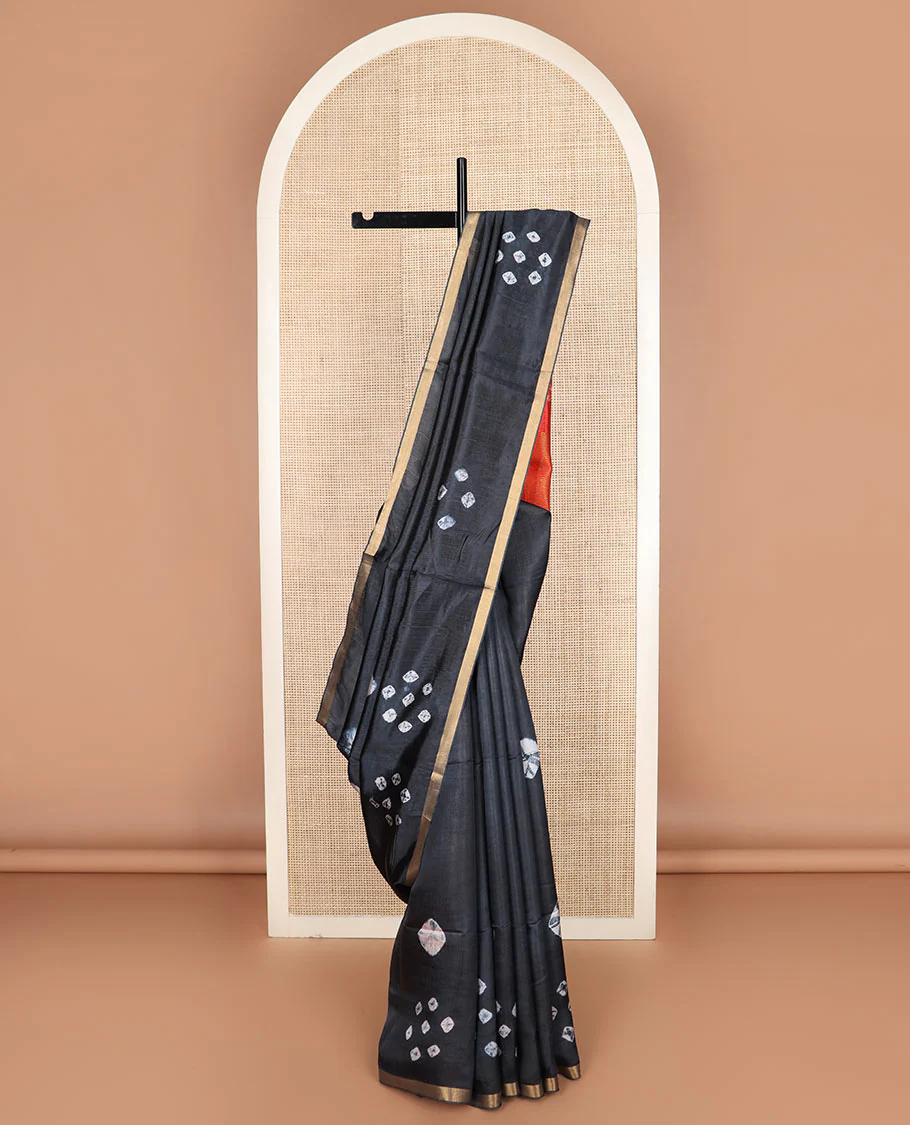 Black shibori printed banana pith saree, piping border, and contrast shibori print with zari stripes