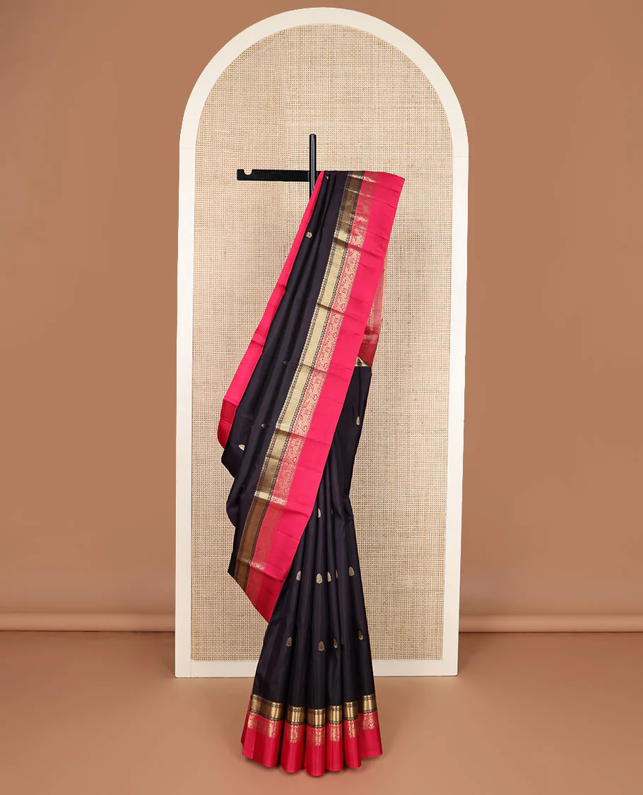 Black zari buttas Vasundhara silk saree, contrast border of diamond, mayil kann, muthu & yaali design & jaal pallu