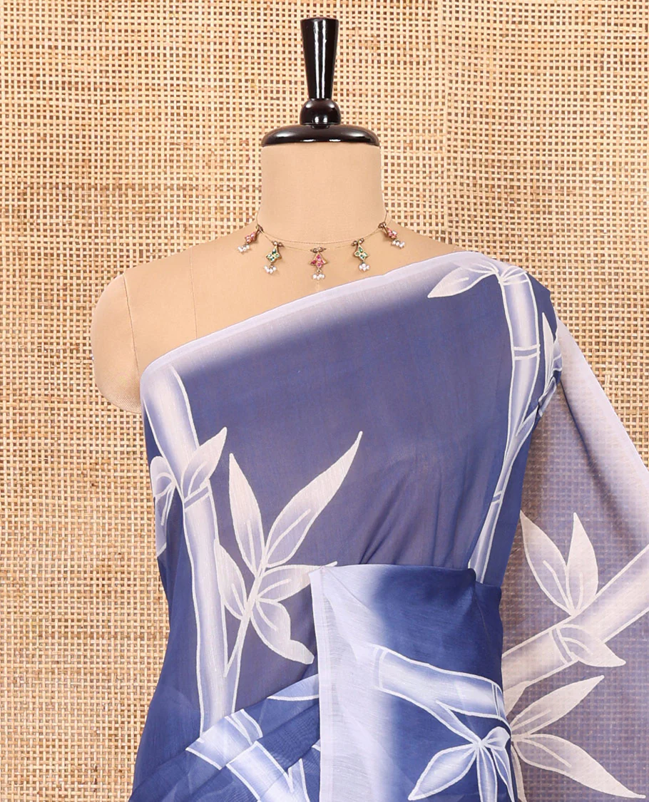 Blue bamboo motifs printed chanderi cotton saree, contrast plain border, bamboo motifs printed pallu, and a contrast unique motifs printed blouse - Image 2