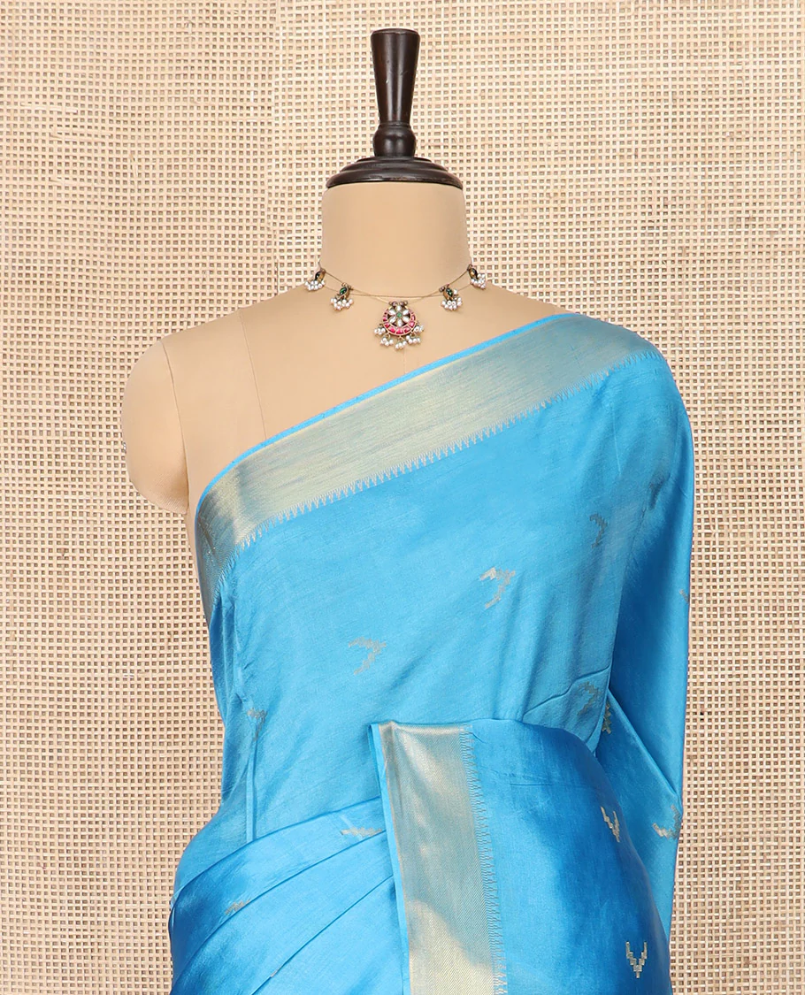 Blue Banana Pith Saree Decorated with Zari Temple Buttas, Delicately Woven Temple Zari Border, Gleaming Zari Pallu of Horizontal Stripes in Zari, and Paired with a Matching Plain Blouse - Image 2