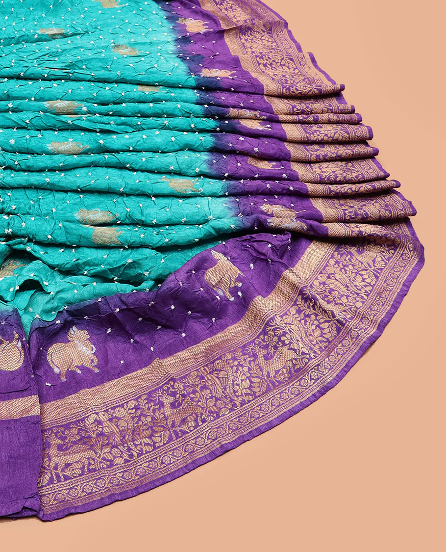 Blue bandhani dots and Pichwai cow motifs bandhani silk saree, contrast Pichwai cow and animal motifs zari border, and patola-style butta enclosed jaal pallu - Image 2