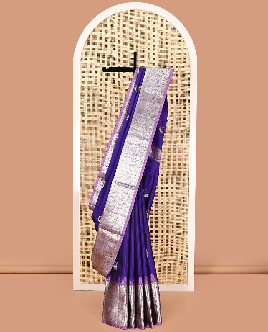 Blue buttas Venkatagiri silk saree, contrast temple traditional border, and ogee patterned pallu