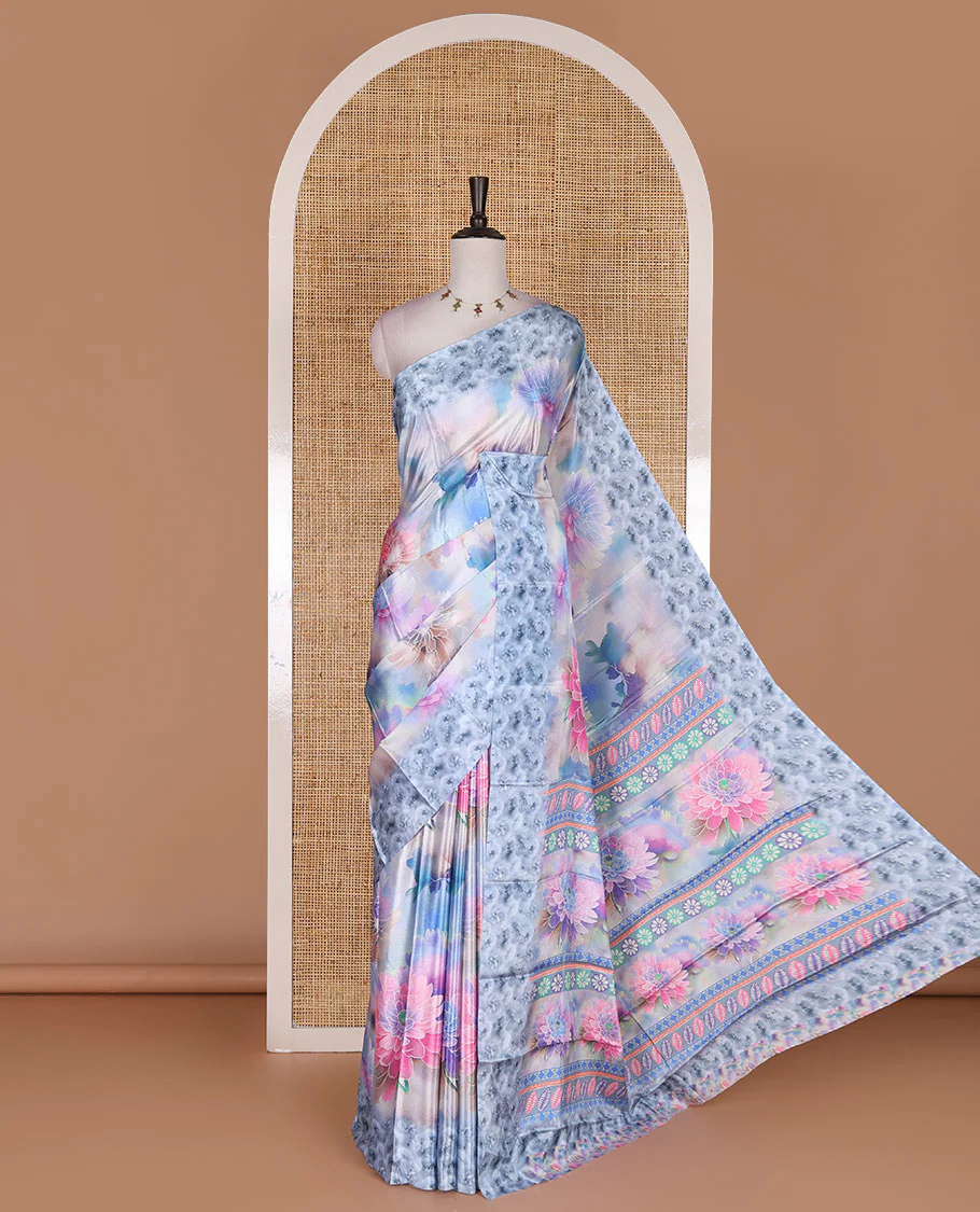 Blue colorful, floral printed turkey crepe saree, floral printed border, pallu, and contrast flower motifs printed blouse