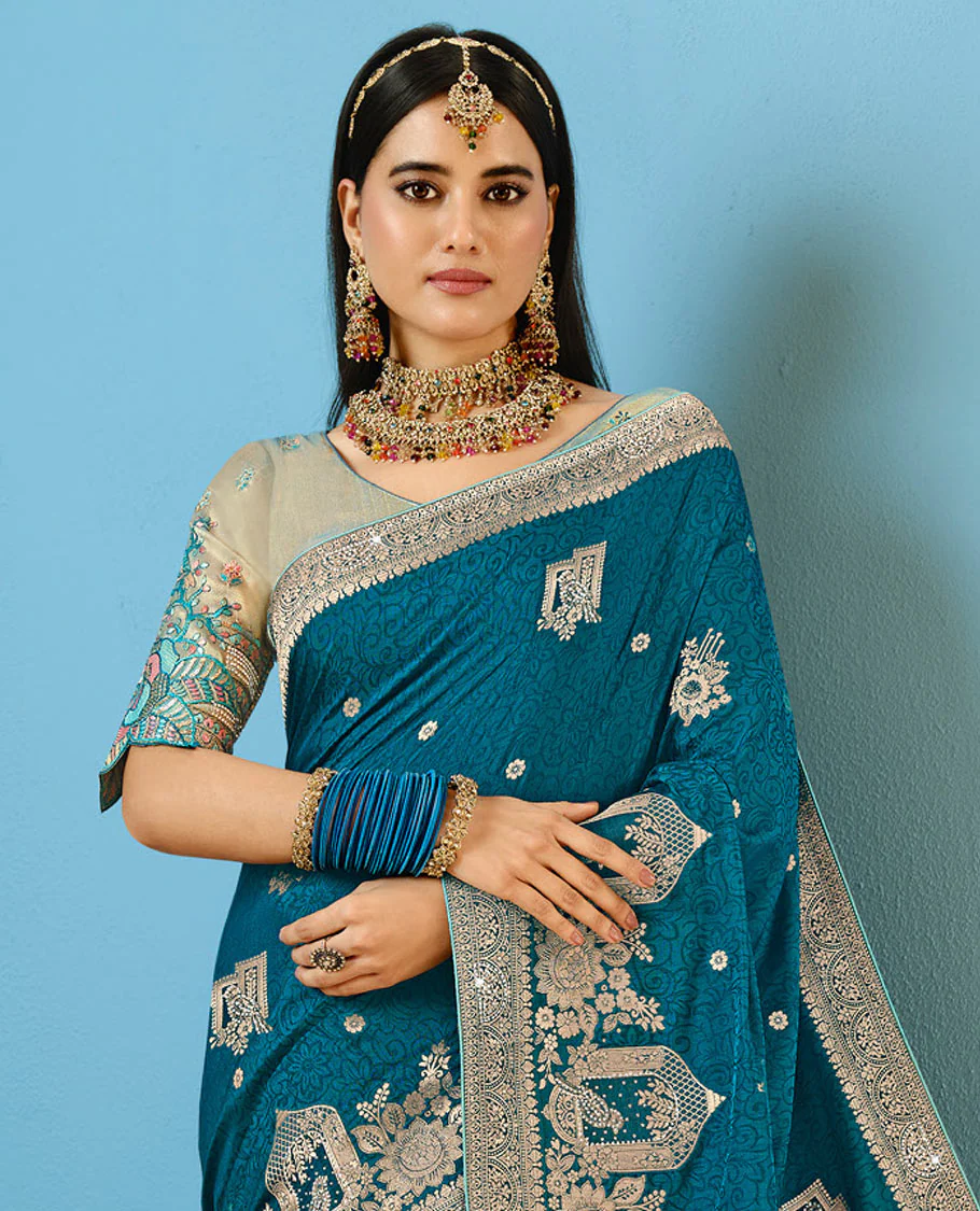 Blue Designer Saree Decorated with Buttas and Embossed Effect, Self-Border Complemented by Mughal-Inspired Motifs, Pallu of Embroidery, and a Contrast Embroidered Blouse - Image 2