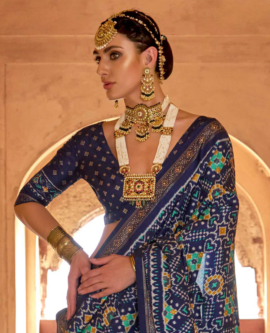 Blue double-ikkat patola printed designer catalog saree, stone work border, and patola patterned pallu - Image 2