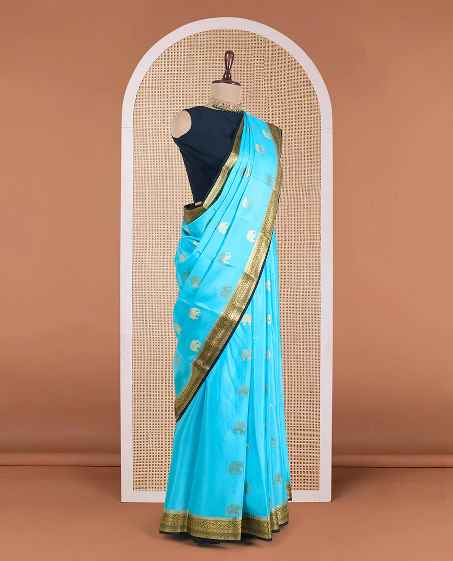 Blue elephant buttas Mysore silk saree, contrast traditional zari border, and pallu of big paisleys