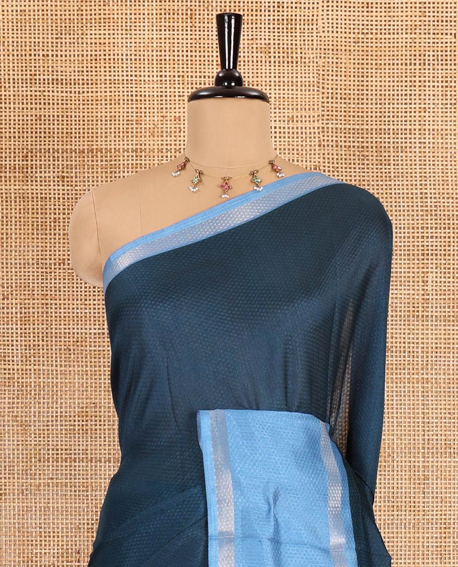 Blue embossed moss chiffon saree, contrast traditional rettai pettu border, embossed pallu, and a contrast embossed blouse - Image 3