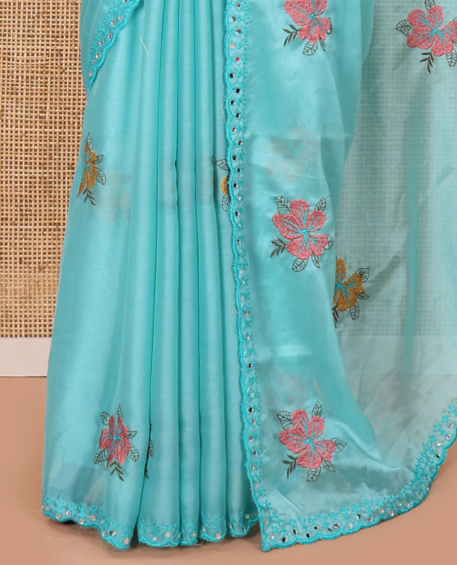 Blue floral motifs embroidered rangoli chiffon saree with mirror work border, embroidered pallu, and a contrast intricate scallop design embroidered blouse - Image 3
