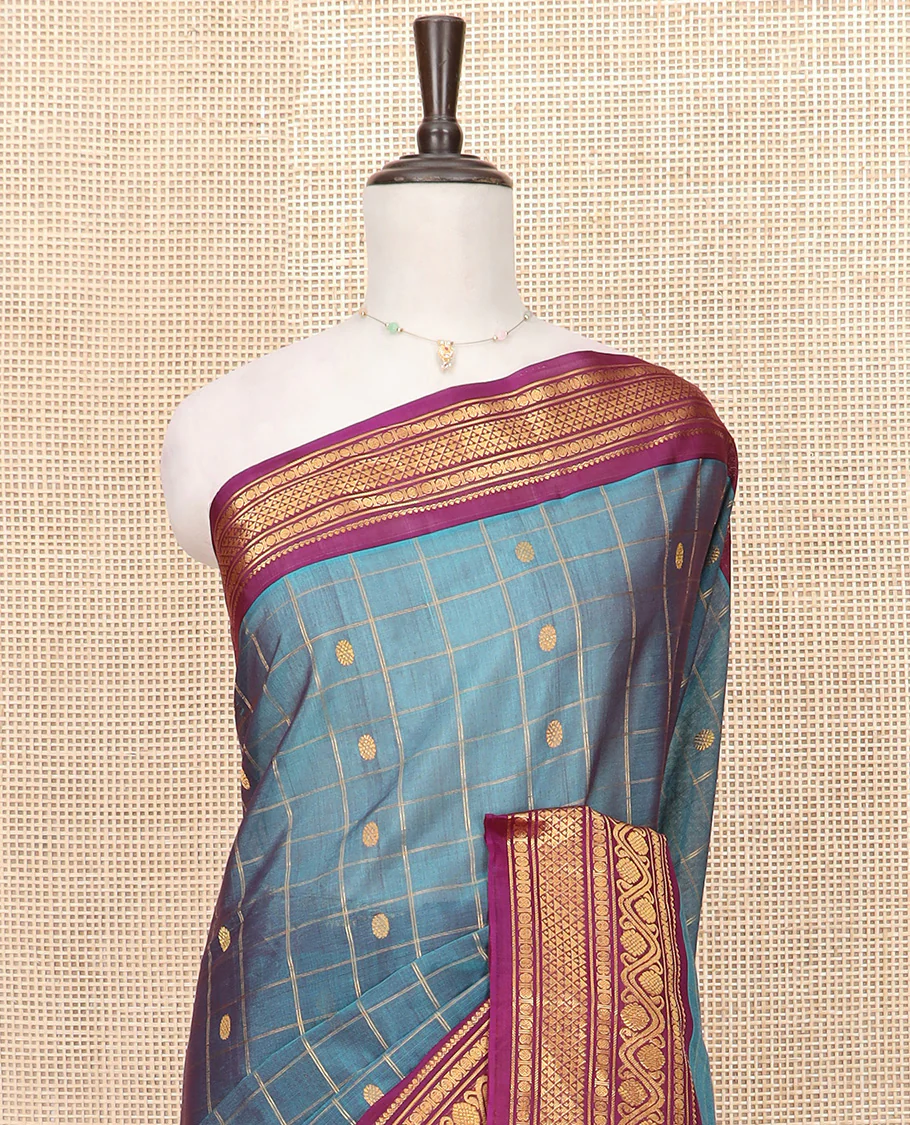 Blue Gadwal Saree Features Zari Butta Enclosed Checks, Contrasting Border Steeped with Traditional Zari Designs, Pallu of Intricate Design, and a Contrast Blouse Ornamented with Zari Designs - Image 2