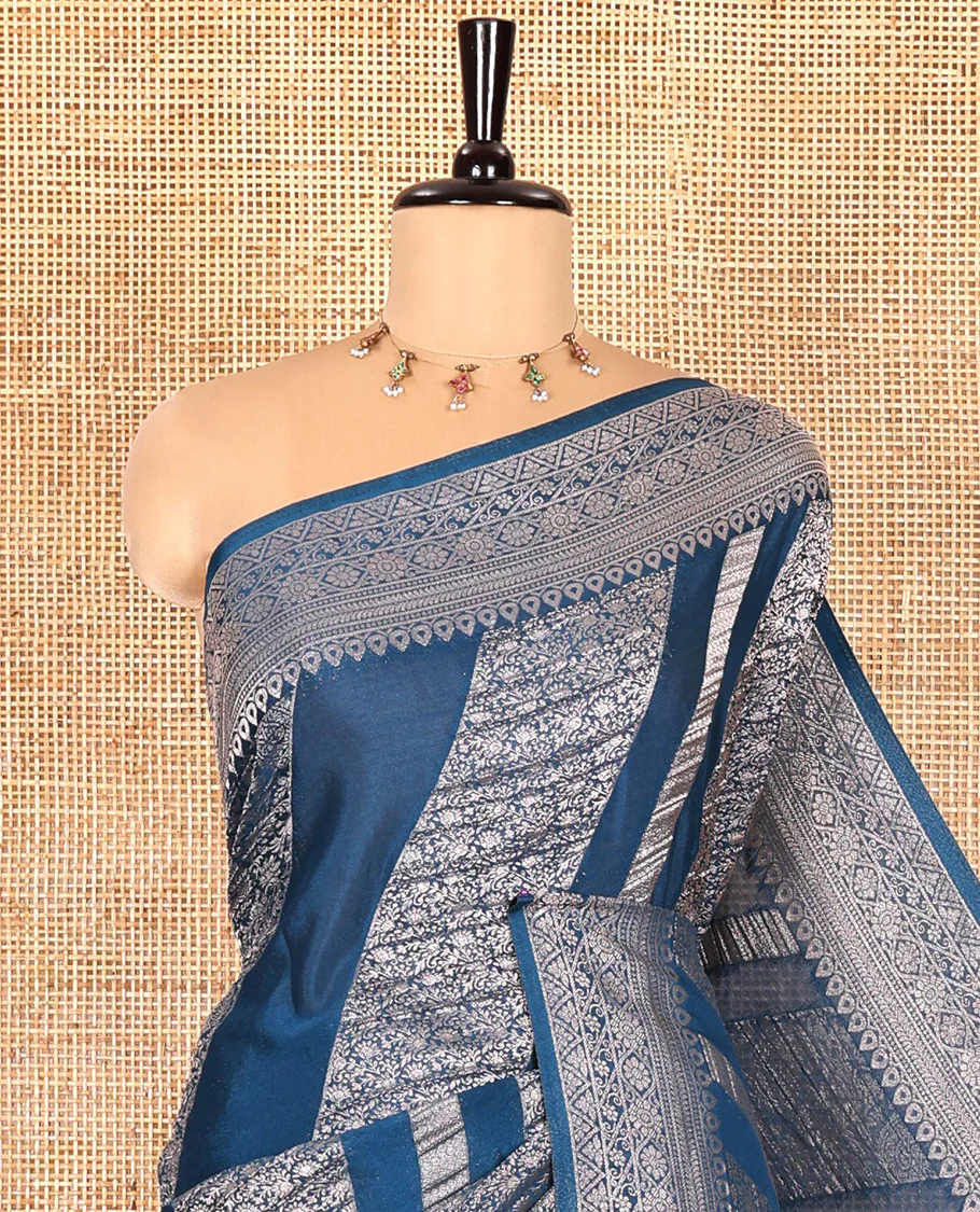 Blue geometric and intricate designs zari woven fancy crepe saree, traditional zari border, floral-star gridded pallu, and a matching blouse - Image 2