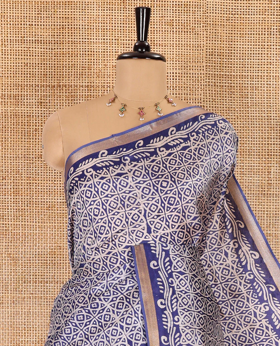 Blue geometric batik printed banana pith saree, printed piping border, paisley motifs steeped pallu, and a matching blouse - Image 2