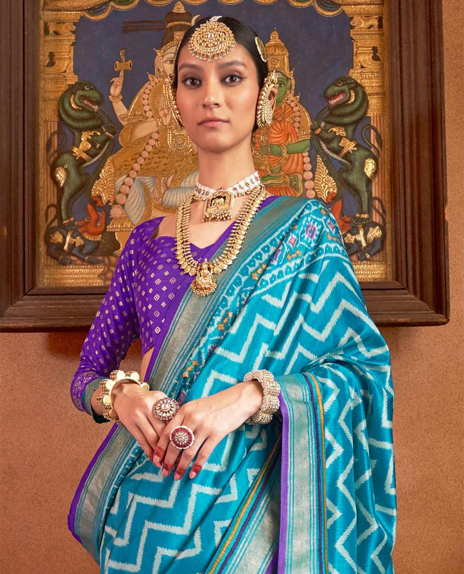 Blue ikkat chevron striped designer catalog saree, zari border and ikkat geometric patterned pallu - Image 2
