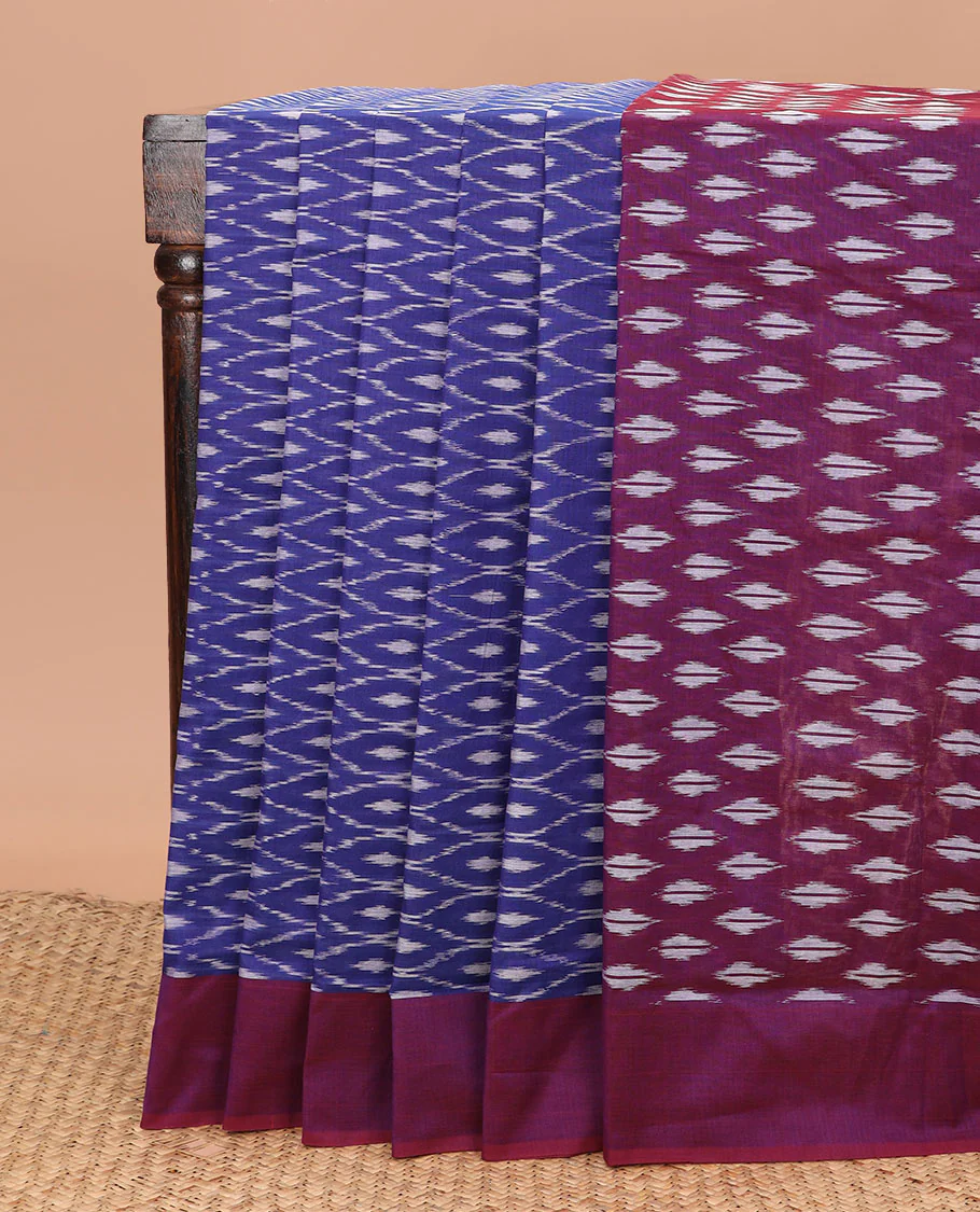 Blue Ikkat Cotton Saree Bedecked with Ogee Patterns in Ikkat Weave, Complemented by a Contrast Plain Border, and Pallu Steeped with Ikkat Buttas