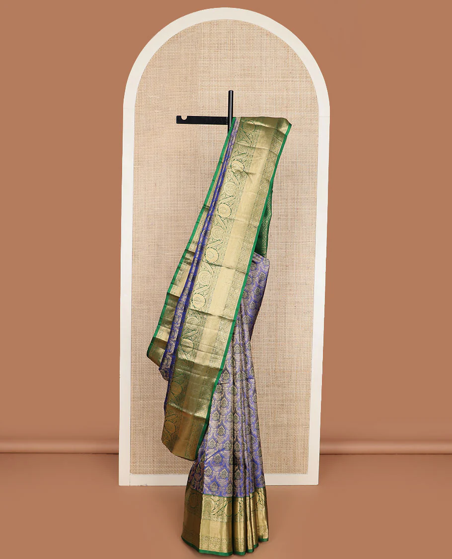 Blue jacquard Kanchipuram wedding silk saree, contrast border of rekku, kathir, dhavana kodi, rudraksham, and diamond designs, and jaal pallu