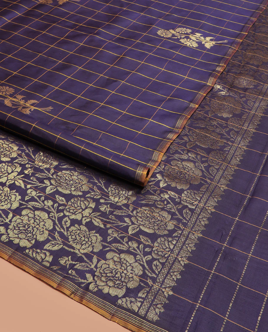 Blue Kanchipuram Silk Saree Highlighted with Floral Buttas Enclosed in Checks, Adorned with a Contrast Piping Border, Pallu Depicting Rose Florals in Zari, Saree Paired with a Matching Blouse - Image 2