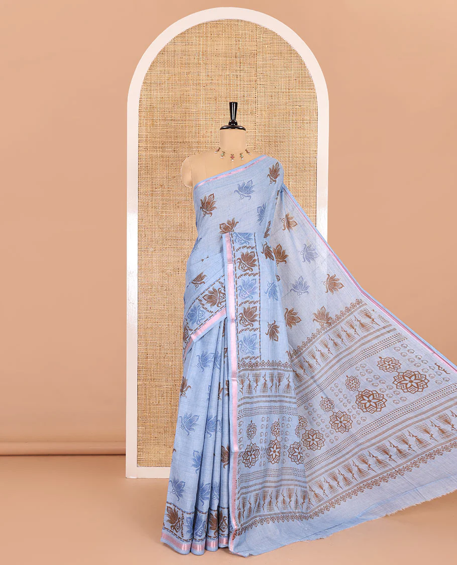 Blue lotus printed soft cotton saree, piping border, printed pallu, and a shibori printed blouse of polka dots