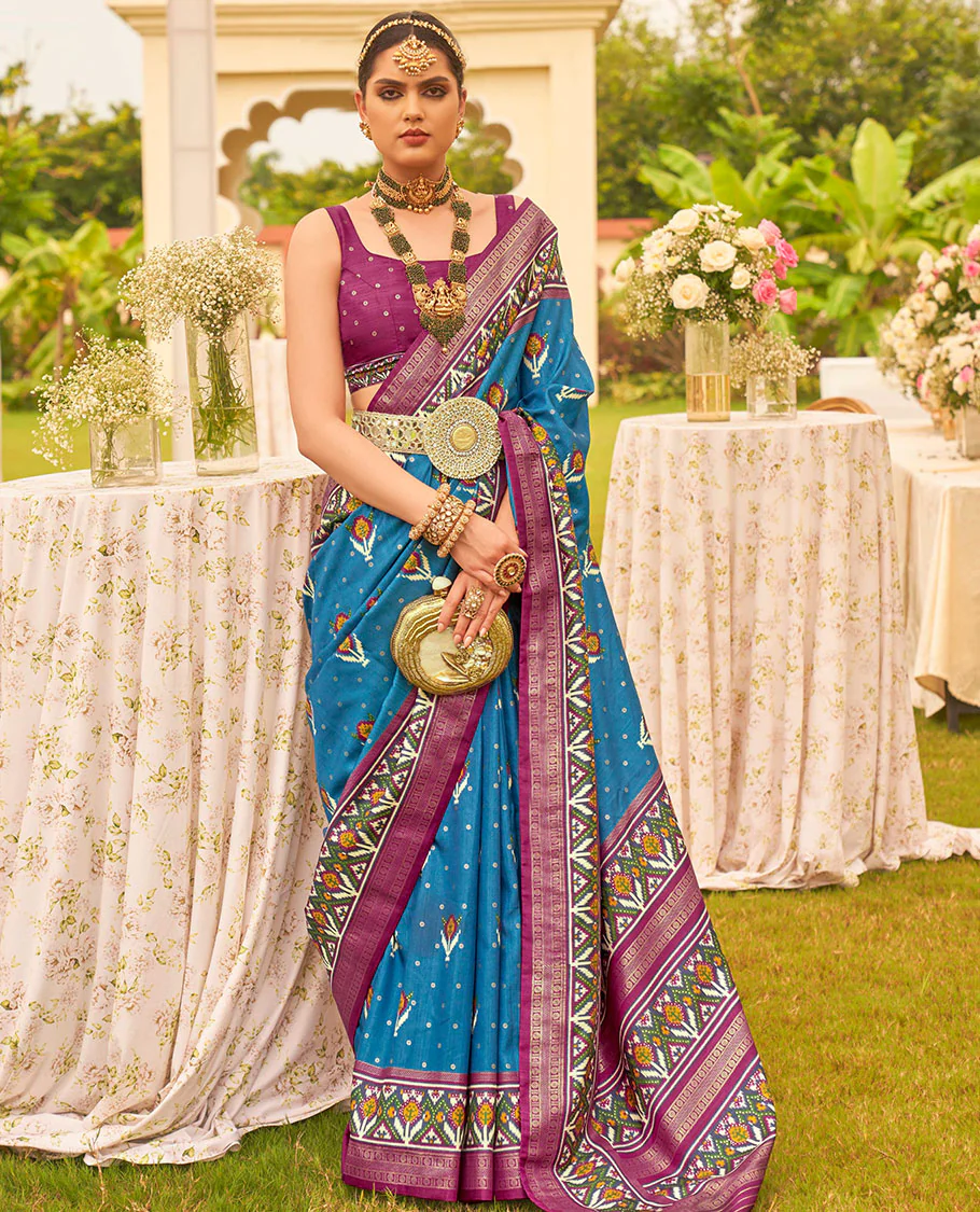 Blue patola floral motifs printed designer saree, contrast intricate patola border, and floral motifs patola printed pallu