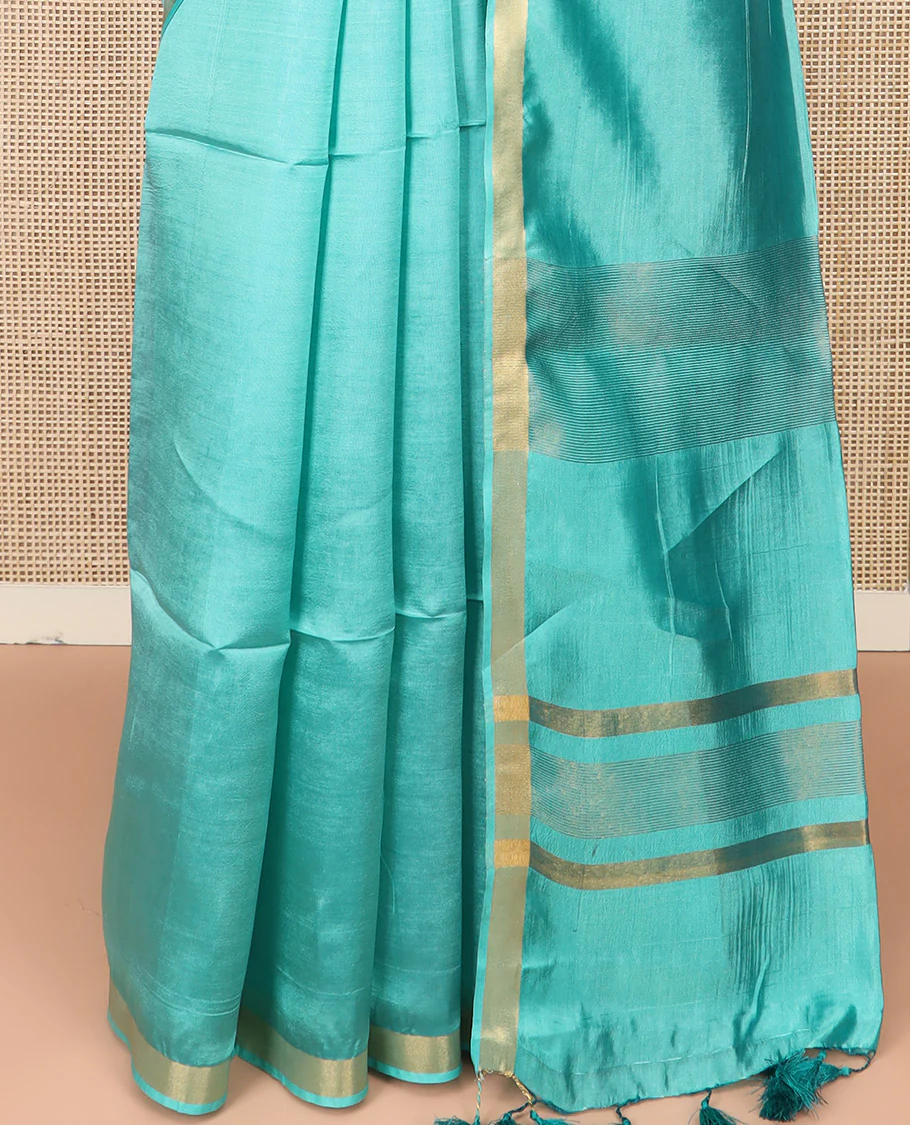 Blue Plain Banana Pith Saree Subtly Sparkled with Zari Bavanji Border, Gleaming Zari Stripes Woven Pallu, and Paired with a Matching Plain Blouse - Image 4