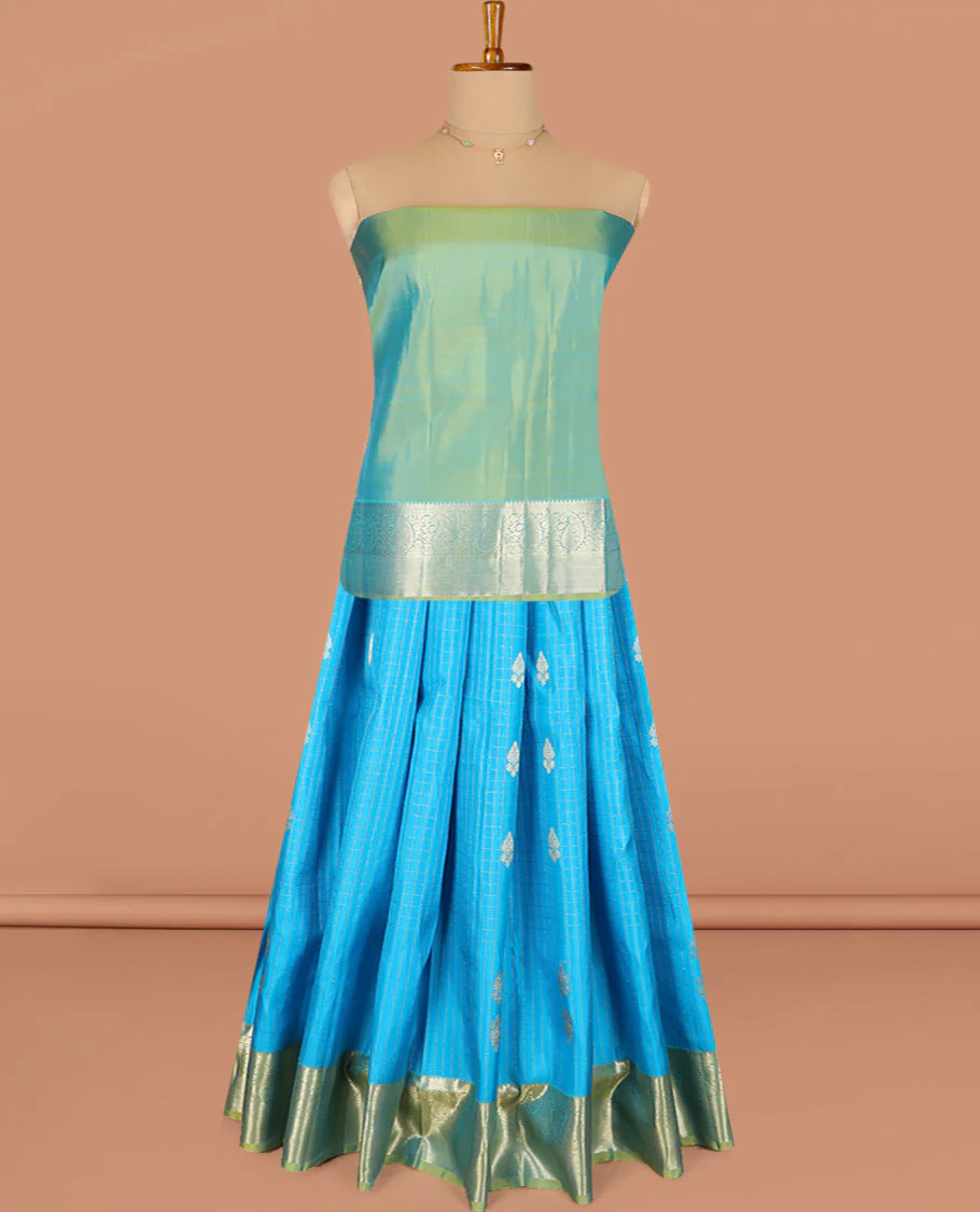 Blue Pure Silk Half-Saree Adorned with Zari Buttas Enclosed in Checks on the Skirt, Complemented by a Contrast Border Featuring Thilakam Mokku, Arumbu Manga, and Mayil Kann Designs, Paired with a Contrast Blouse, and a Jaal Design Dhavani - Image 3